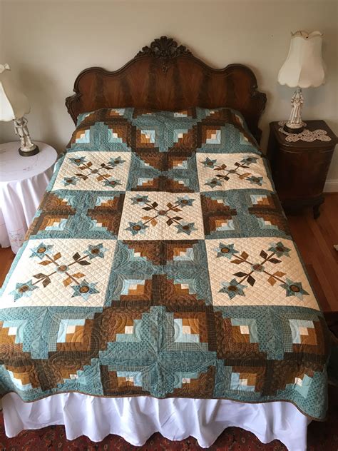 I spent hours pouring over websites of various local florists in the area. "Cabin Flowers" designed by Vicki Bellino- log cabin quilt ...