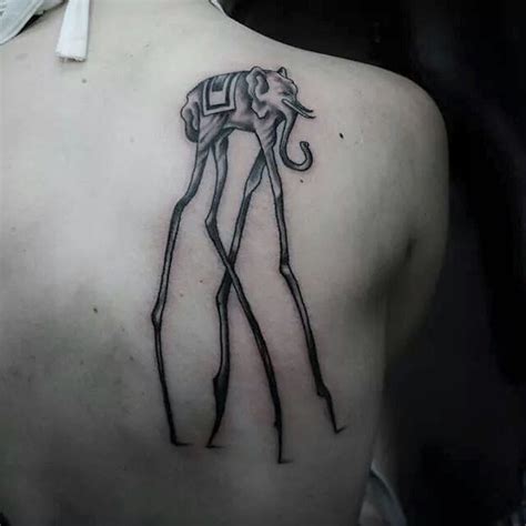 This tattoo needs some explanation. Dali Elephant Tattoo | Best tattoo design ideas