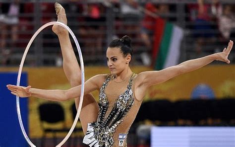 Israel's linoy ashram competes during the rhythmic gymnastics individual ball final at the european rhythmic gymnastics championships in varna, bulgaria, june 12, 2021. Israeli rhythmic gymnast bags three golds in Spanish ...