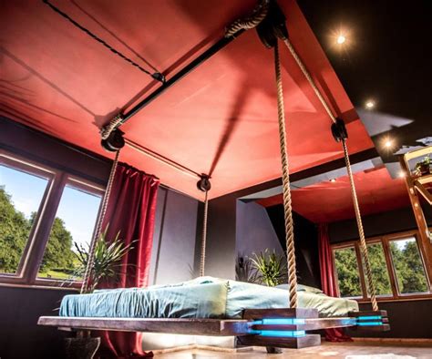 Some floating bed platforms are anchored to the wall and held up with a single support leg. Retractable Hanging Bed | Hanging bed, Hanging furniture ...