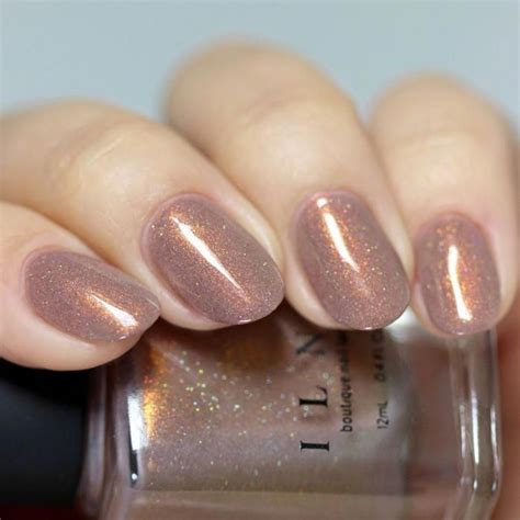 You must remember not to use too much of this as it can cause damage to your real nails. Quicksand - Refined Warm Taupe Holographic Nail Polish by ILNP | Holographic nails