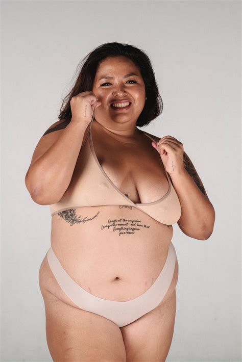 Cheerful Asian lady in underwear in studio · Free Stock Photo