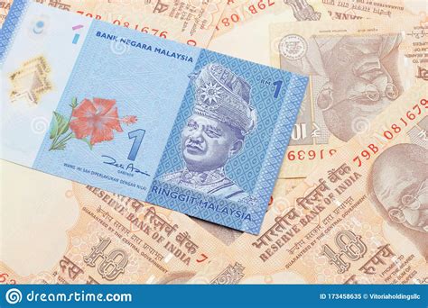 Moreover, we added the list of the most popular conversions for visualization and the history table with exchange rate diagram for 1. A Malaysian Ringgit On A Background Of Indian Ten Rupee ...