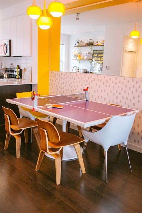 Hays wanted a ping pong table for himself, though he could not justify creating a large piece of furniture just for sport. A Creative, Colorful Canadian Townhouse | Unique dining ...