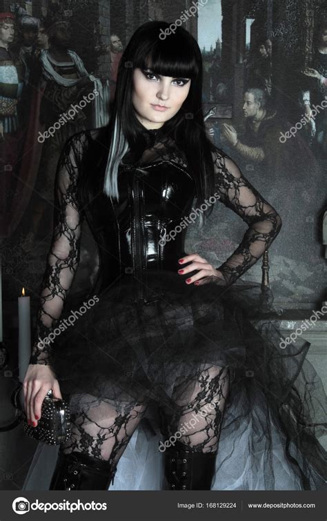 To vote, please use the stars on the bottom. beautiful gothic lady wearing lace catsuit and shiny black ...