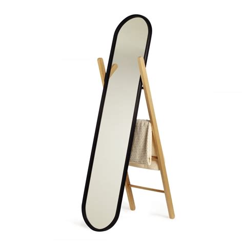 Oversized decorative mirror with rubber bumper. Umbra Hub Floor Mirror | Black/Natural | Black by Design