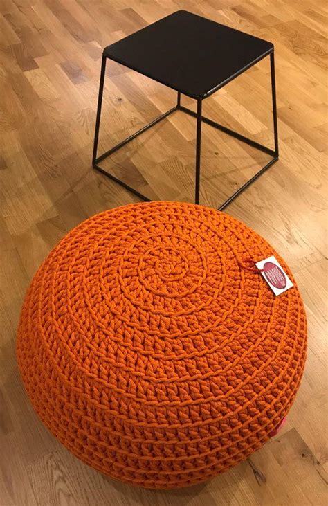 Equal parts seat, footrest and side table, they flex to suit your needs. Orange Pouf Ottoman outdoor cushion handmade with crochet ...