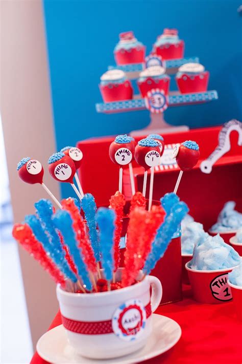 The hanging pom poms and tissue keri pulled off this amazing party with thoughtful touches such as decorating with original dr. Kara's Party Ideas Cat in the Hat Themed Birthday Party ...