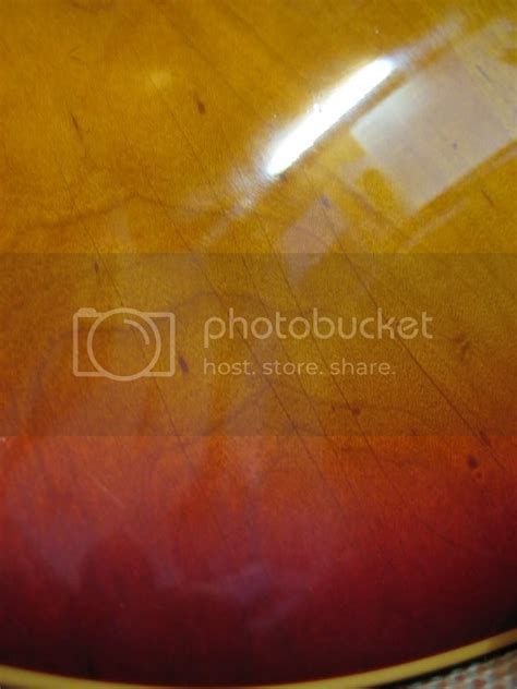 On unfinished wood, apply sufficient lacquer to seal open joints, edges and end grain. lacquer cracks! | My Les Paul Forum