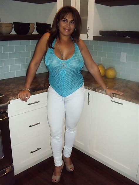 It really hits her when he prefers to watch a boxing match to kissing, so she paints her apartment. Latin milf at stire - New Sex Images