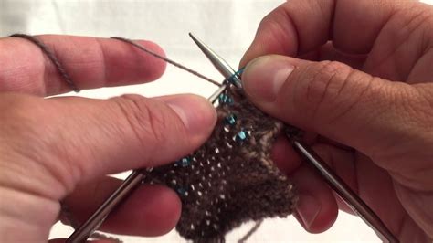 Knitting sk2p abbreviation meaning defined here. sk2p with bead - YouTube