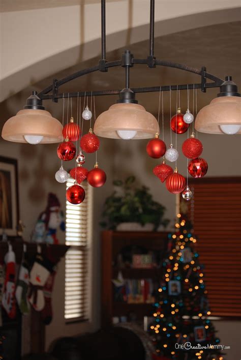 Ideas for decorating a chandelier for christmas. Quick and Easy Christmas Chandelier - onecreativemommy.com
