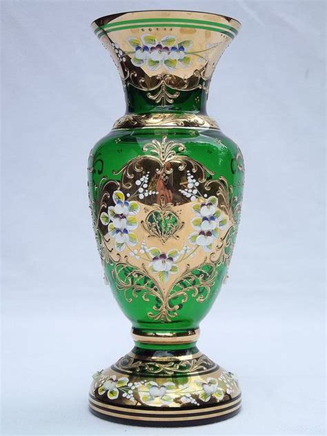 Maybe you would like to learn more about one of these? 8" Mirea Bohemian raised enamel & gold green glass vase ...