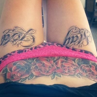 Red roses and gun tattoo on man left shoulder. Lower stomach rose tattoo | Stomach tattoos women, Abdomen ...