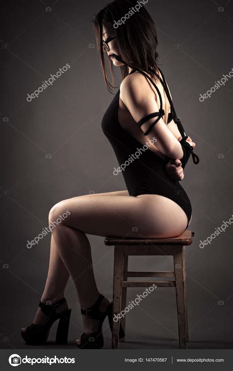 Chubby ballerina loves flexible positions. Tied with rope korean woman sitting in chair, bondage ...
