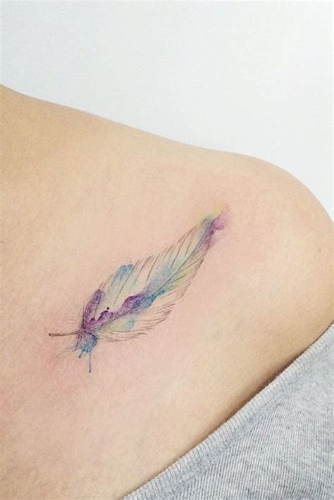 A small feather under the ear lobe gives some tenderness to the classic modern lady. The Guide To Any Feather Tattoo Of Your Choice | Small ...