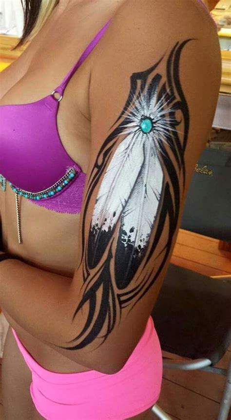 Create a custom face mask and make a fashion statement. Mark Reid feather face paint | Indian feather tattoos ...
