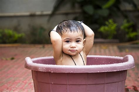 Flush the toilet while you're still sitting on it, stand up and pull your underwear up, then go stand in the shower and take your underwear off. Teaching Your Kid To Take A Bath - Baby Bath Moments