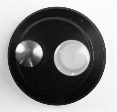 Replace the lens with one of the two included punches and strike it with a hammer to mark the hole center. Used On Mark Optical Center Punch