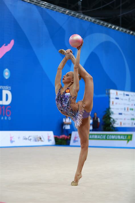 Performing routines with music, gymnasts amaze audiences with their astonishing skill with. Free Images : shoe, girl, indoor, blue, skill, gym, world ...