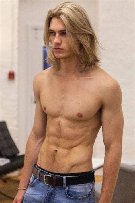 The curly hair is blonde and styled with a blowout fade haircut. Mikey's Fabulous Gay Blog: Guys with Long Hair: Part 1