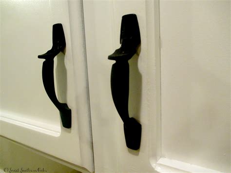 The process of painting and reusing old cabinet hinges is tedious and, in the end, is not going to be as effective as buying brand new hinges. How to Spray Paint Cabinet Hardware - Sweet Southern Oaks