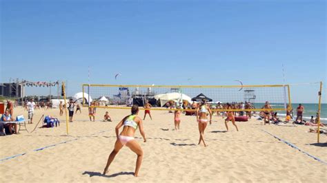 Girls in silky tights playing with a strapon. Female Beach Volleyball. Paired Teams of Girls Playing ...