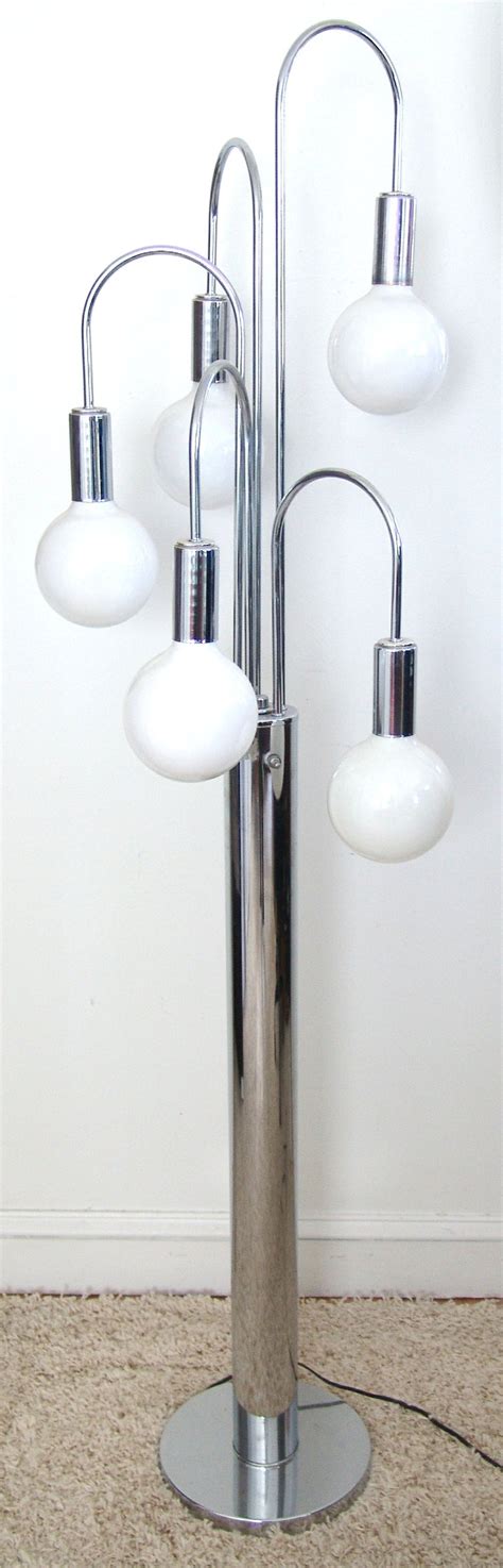 Spiders live in every house, catching mosquitoes and flies. Mid-Century Modern Chrome Floor Spider Lamp For Sale at 1stdibs