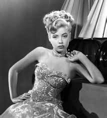 Frances bavier, born in 1902, would have been 47 in 1949 and never posed for any cheesecake photos. So, this lovely woman here was an actress named Frances ...