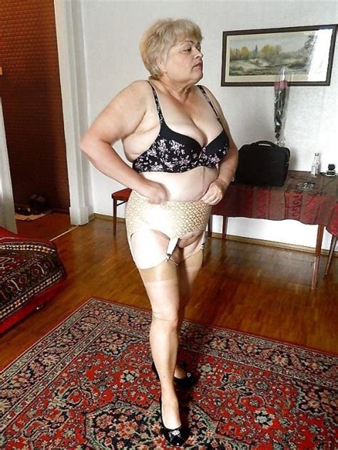 She spends half of her life dressing, the other half undressing. Granny Old Mature - Granny Nylon