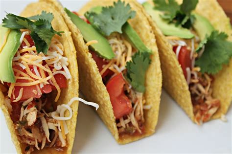 Place chicken in the bottom of the slow cooker. {Healthier} Crockpot Chicken Tacos - Carolina Charm