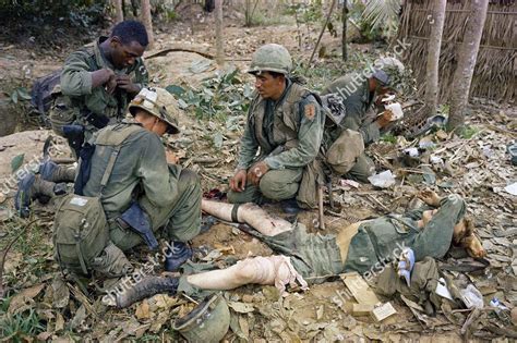 vietnam-war-us-troops-wounded-soldier-writhing-editorial-stock-photo