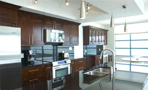 If you are looking for a brand new kitchen or updating your old one there are various ways to obtain the style you want at an affordable price. MILANO-WALNUT-1 - Kitchen Cabinets and Granite Countertops, Pompano Beach FL