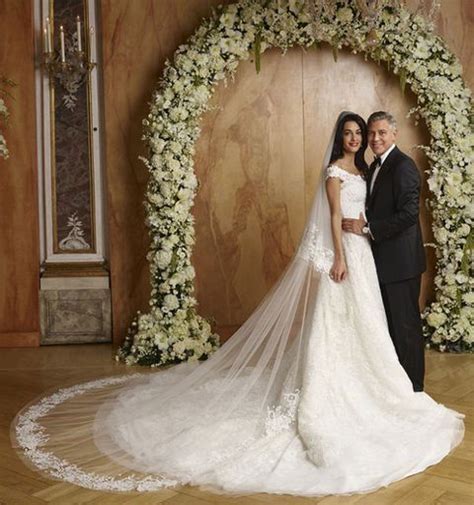 This was the time when amal attended a friend's wedding. Amal Alamuddin's Wedding Dress