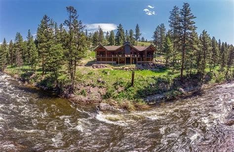 It is equipped with a full kitchen with a dining table. Pin by Gary Jorgensen on Cabins | River lodge, Custom ...