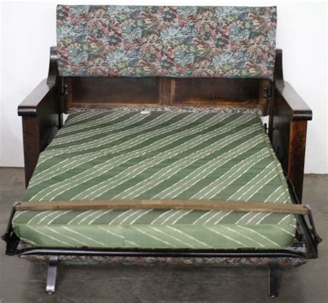 Recently, a piece of furniture has come into my life from a relative. Antique Kroehler Sofa Bed