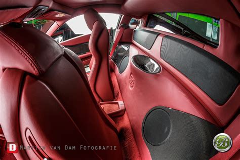 The dashboard has few physical buttons since most of the controls are located on the steering wheel. Ferrari 458 Italia gets equipped with unique audio system