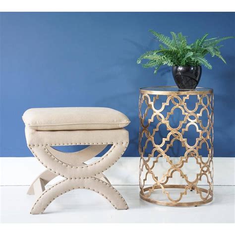 Distressed quatrefoil end table with mirror accent the distressed quatrefoil end table smoothly fuses modern design with shabby chic characteristics. Quatrefoil Metal Side Table | Metal side table, Side table ...