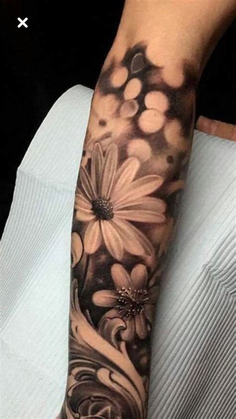 The tattoo has a rich historical reference and can portray a woman's the lovely daisy is a small tattoo in pink color with the words love written on the flower stem. Daisy Flower Tattoos | Daisy Flower Tattoo Meaning & Designs