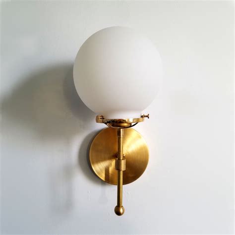 Wood sconce with votive cup. white glass globe wall sconce with brass bathroom light ...