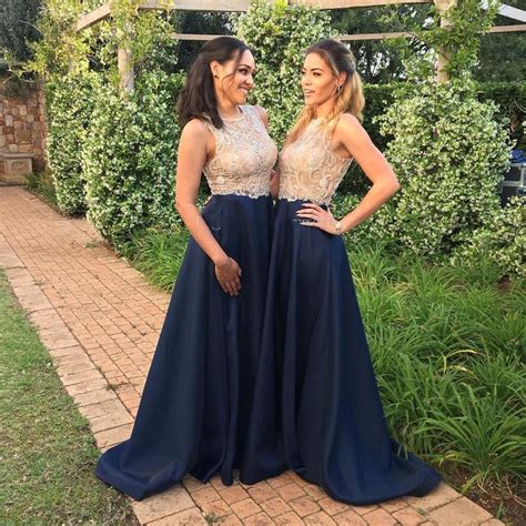 Rock this gorgeous collection of cheap navy blue bridesmaid dresses. Gold And Blue Bridesmaid Dresses Navy Blue Sheer Neck Beaded Top Floor Length 2018 Wedding Guest ...