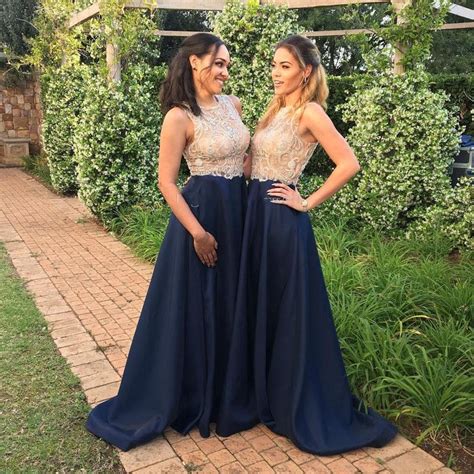 It will also flattering to add more brightness with berry color. Gold And Blue Bridesmaid Dresses Navy Blue Sheer Neck Beaded Top Floor Length 2018 Wedding Guest ...