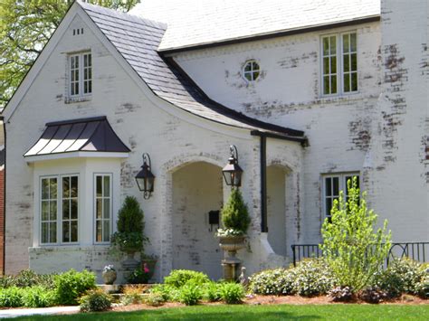 If you have the option test your whitewash technique on a scrap piece of brick paneling or a brick. C.B.I.D. HOME DECOR and DESIGN: CURB APPEAL