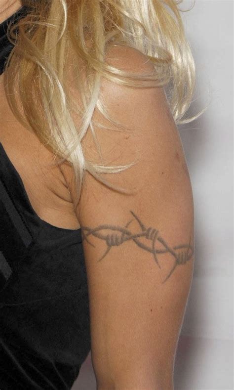 The mother of two actually underwent laser treatments to have the barbed wire tattoo removed. Pin on mods