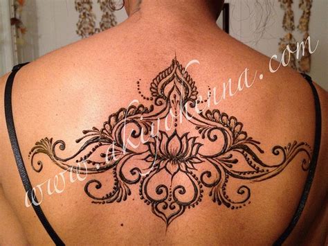 You can adjust the size of the design to fit to the areas you are placing this on. Lotus Henna on back | Back henna, Lotus henna, Henna tattoo