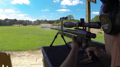 A barrett.50 cal military sniper rifle. 50 cal bmg at 300 yards - YouTube