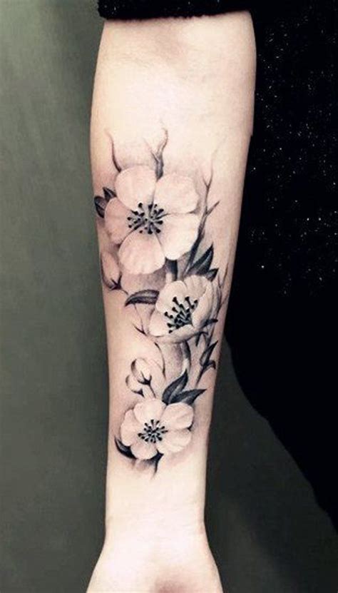 Secret ink are cornwall's premier tattooists and piercers. Black Floral Wrist Tattoo - MyBodiArt.com | Floral tattoo, Blossom tattoo, Tattoos for women