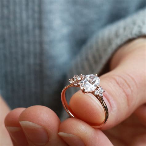 The rumors got started a couple of weeks ago, thanks to in touch weekly, some paparazzi photos, and an anonymous, insider source.. Portia ~ Oval Cluster Ring | Cluster engagement ring, 14k rose gold engagement rings, Classic ...
