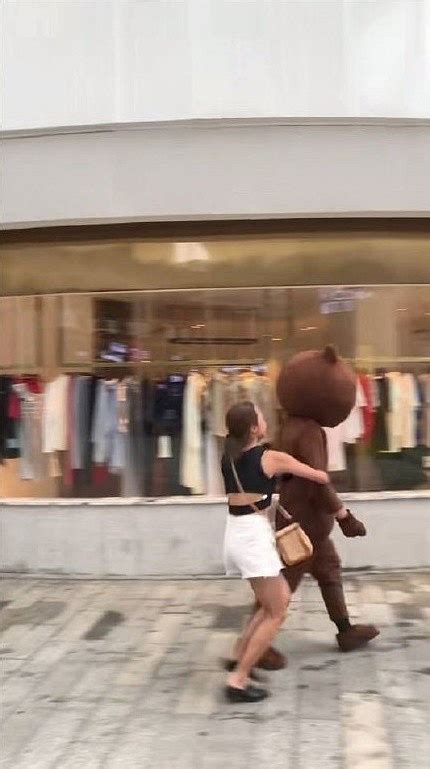 Jade filmed the incident on her phone before sharing it online. Man Travels 2,400km & Wears Bear Costume to Surprise GF ...