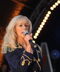 That she wants to permanently combine her work with her singing career. de Megaman: Marga Bult zit 40 jaar in het vak